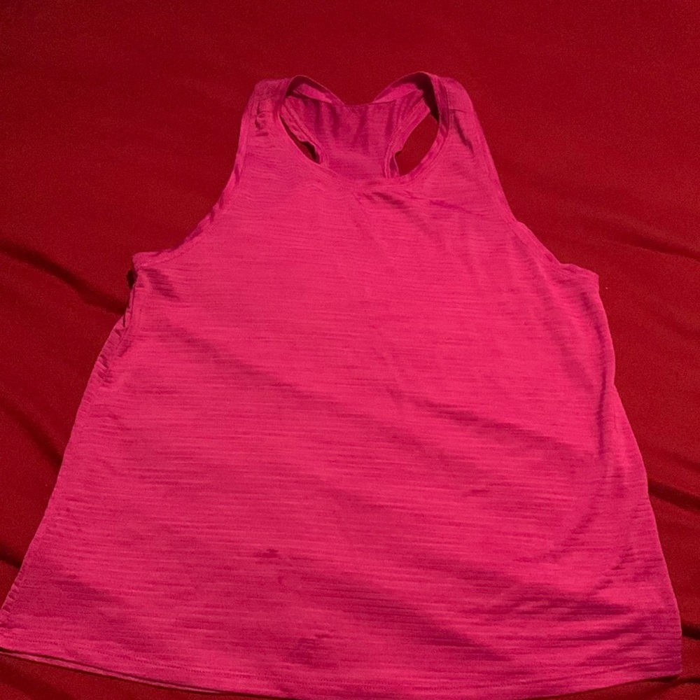 Girls tank top w/not tags.  Clean, Pet/smoke free home.